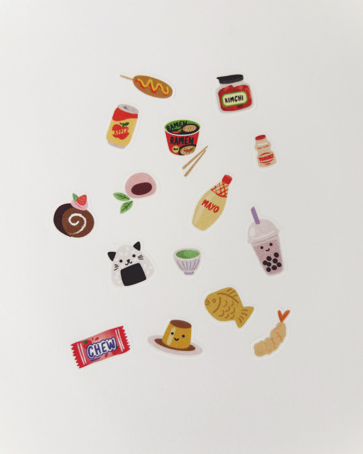 Colorful stickers of Asian snacks and drinks on a white background