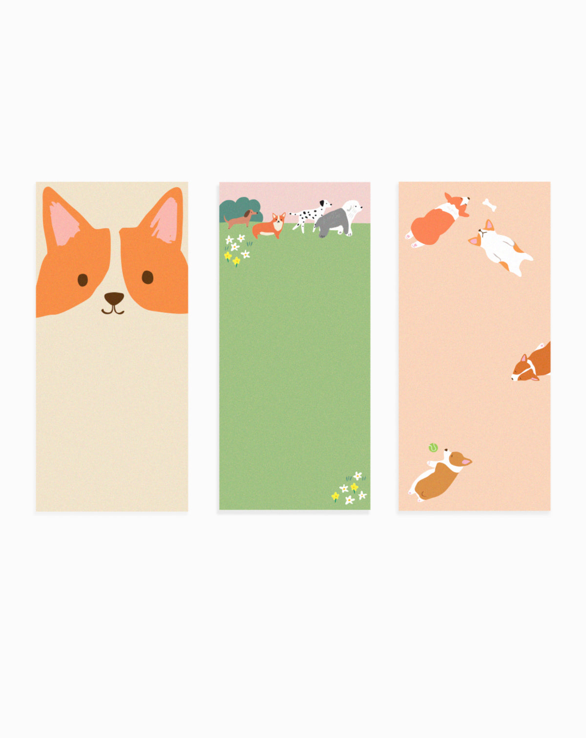 Notepad with three dog-themed designs, shown with one sheet of each design laid out side by side.