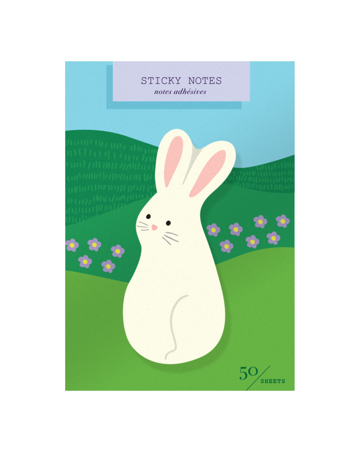 Package of die-cut sticky notes featuring a bunny on a packaging card illustrated with hills and flowers