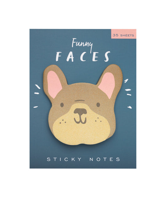 Die cut sticky notes with a french bulldog face design on a pale blue background.