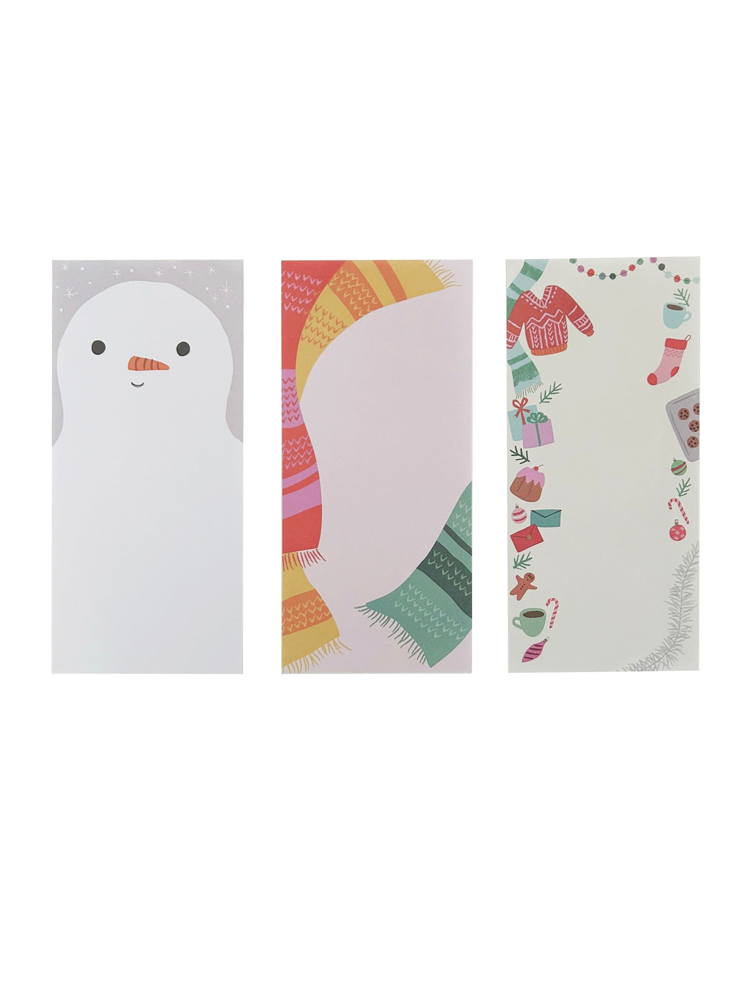Notepad with three holiday-themed designs, shown with one sheet of each design laid out side by side. 