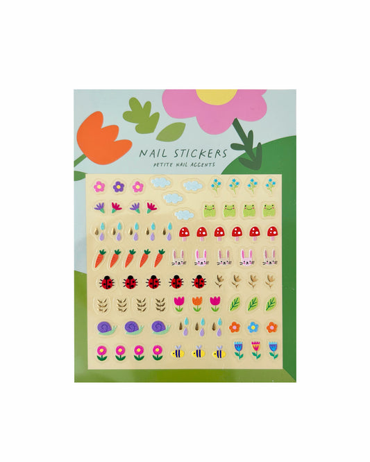 A sheet of Garden Charm nail stickers packaged on a card featuring a flower design. 
