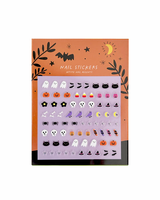 Halloween-themed nail stickers with decorative packaging on a white background