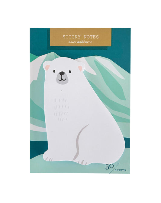 Sticky notes with a polar bear design on a green packaging  background with iceberg