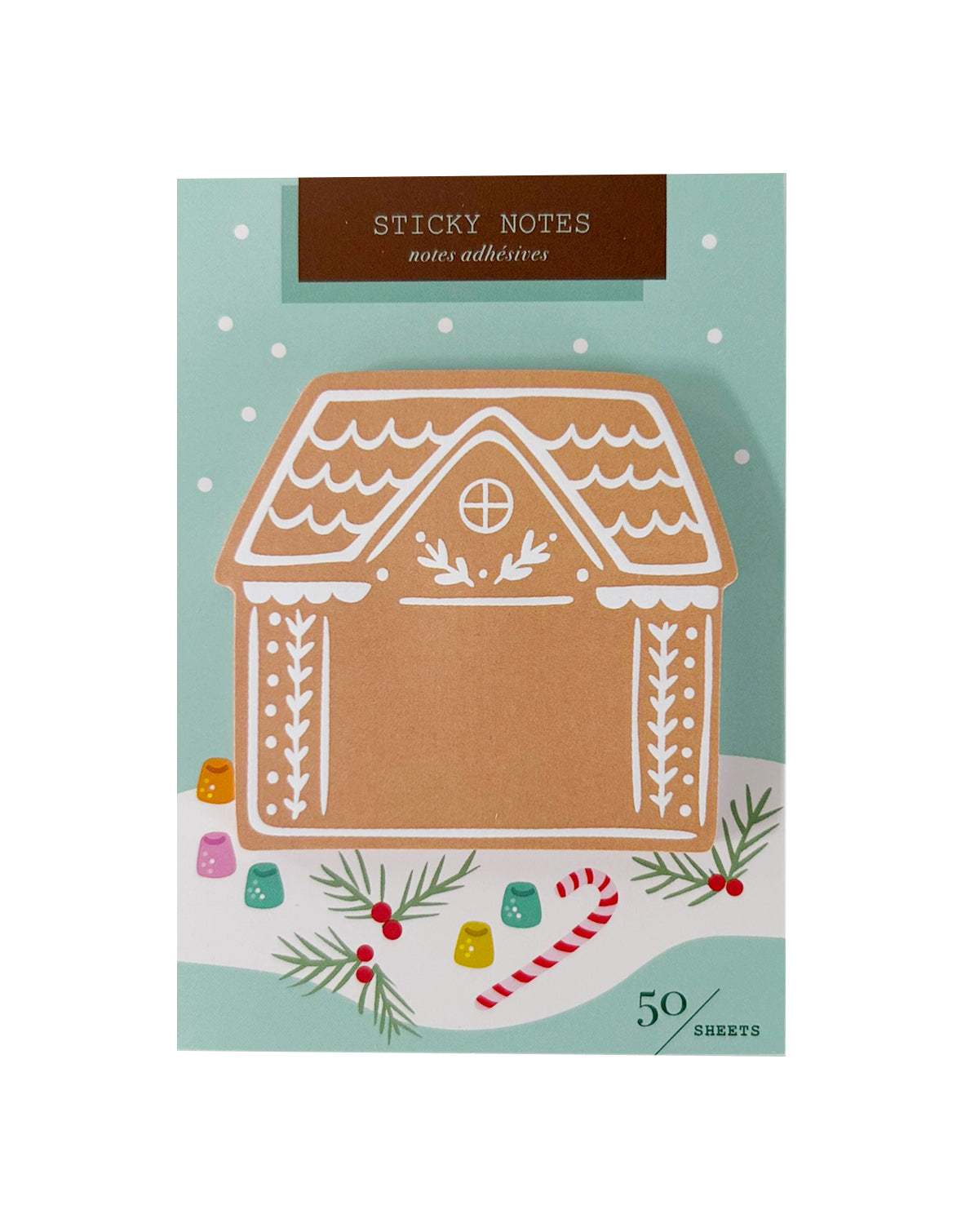 A pack of Christmas-themed sticky notes featuring a gingerbread house illustration on a mint green background with holiday decorations and the text 'STICKY NOTES' and '50 sheets'.