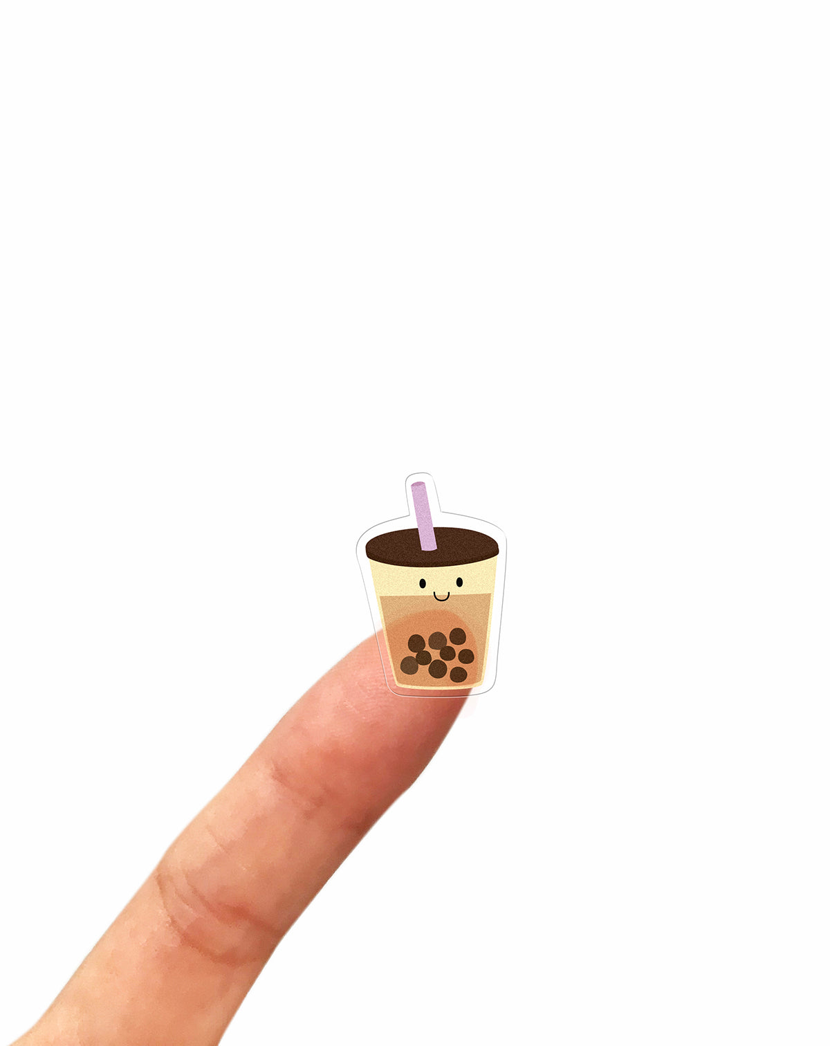 Clear, smiling bubble tea sticker on a finger with a white background
