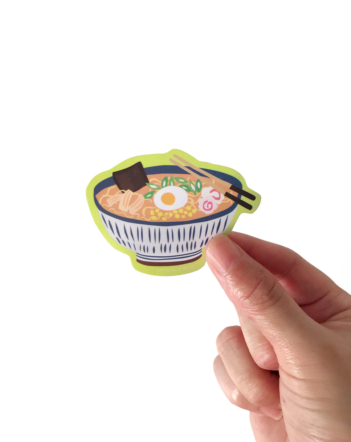 Vinyl sticker of a bowl of ramen held by a hand on a white background 